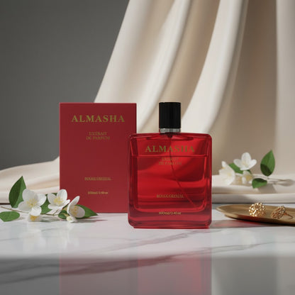 Almasha Rouge Crystal, a unisex luxury perfume in a striking red glass bottle with gold lettering. 100ml.